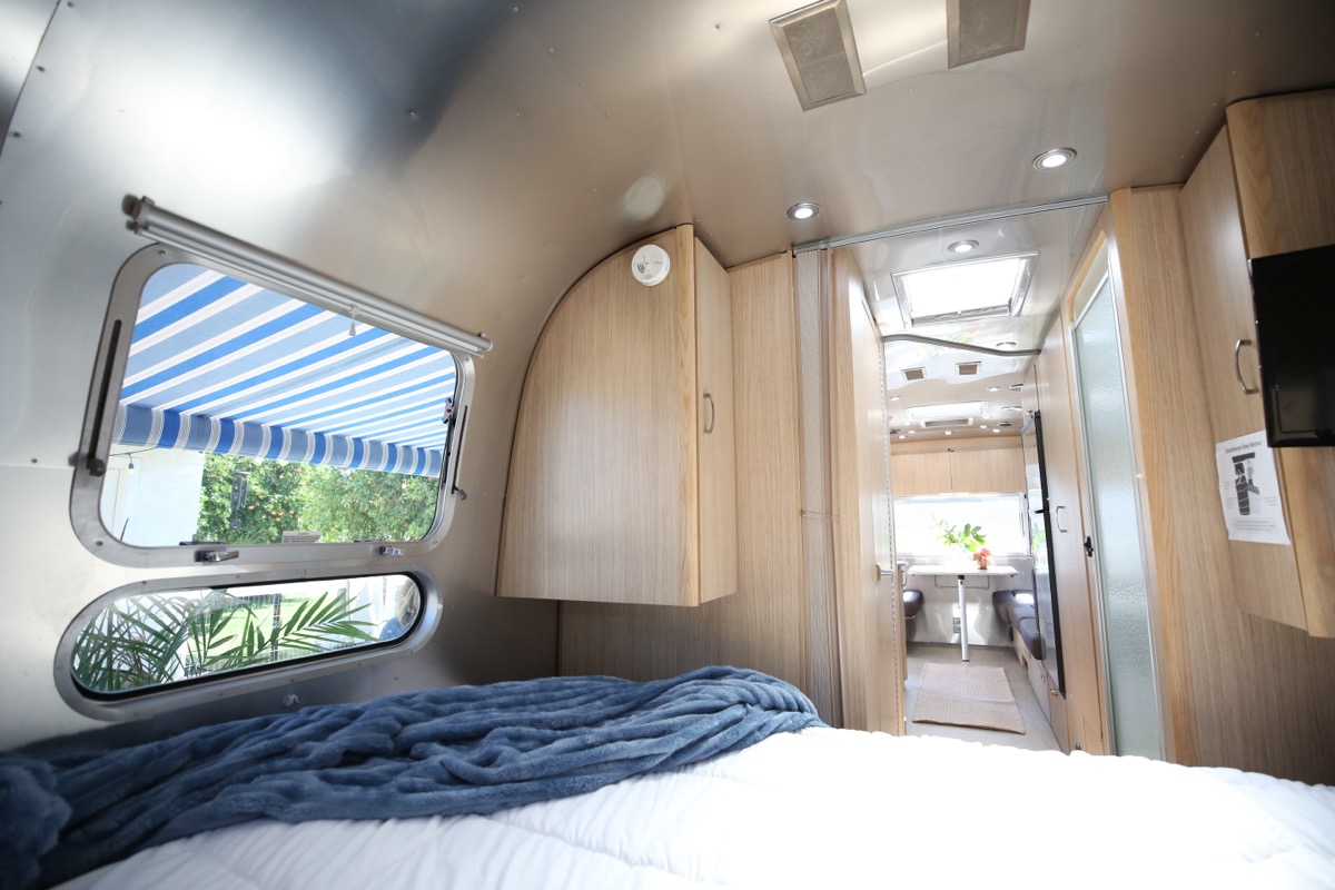 The made-up bed inside the Airstream lounge